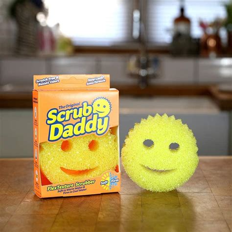 Scrub Daddy Original yellow smiley sponge in orange packaging